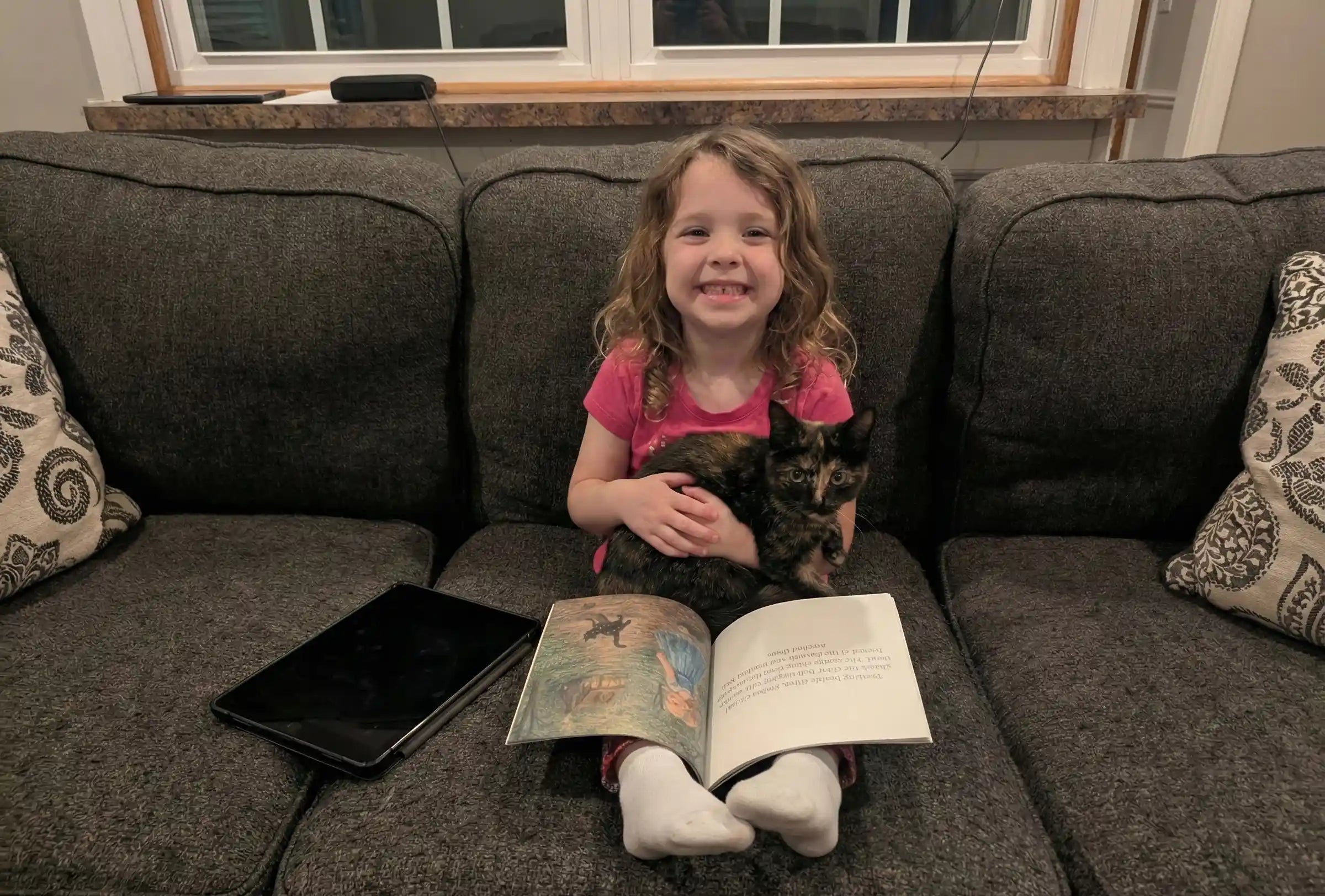 Screen-free activities for kids: child choosing to read personalized book instead of using tablet